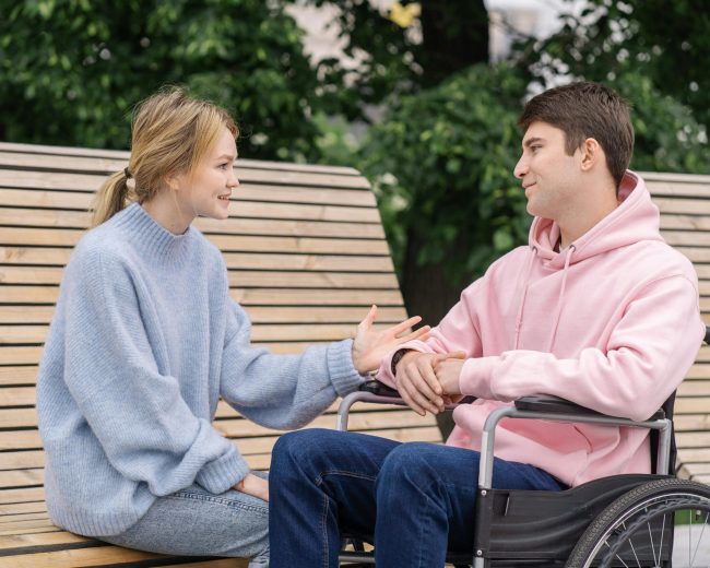 NDIS participant receiving positive behaviour support from disability support worker in Sydney