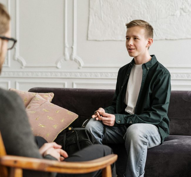 therapist supporting during behavioural session